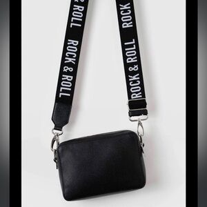Saint & Sofia Black Leather Crossbody
Bag with Rock and Roll Strap